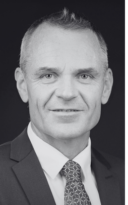 Portrait of man, suit, tie, hair, smile