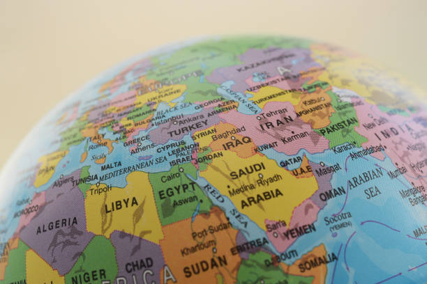 An image containing text, map, globe, World