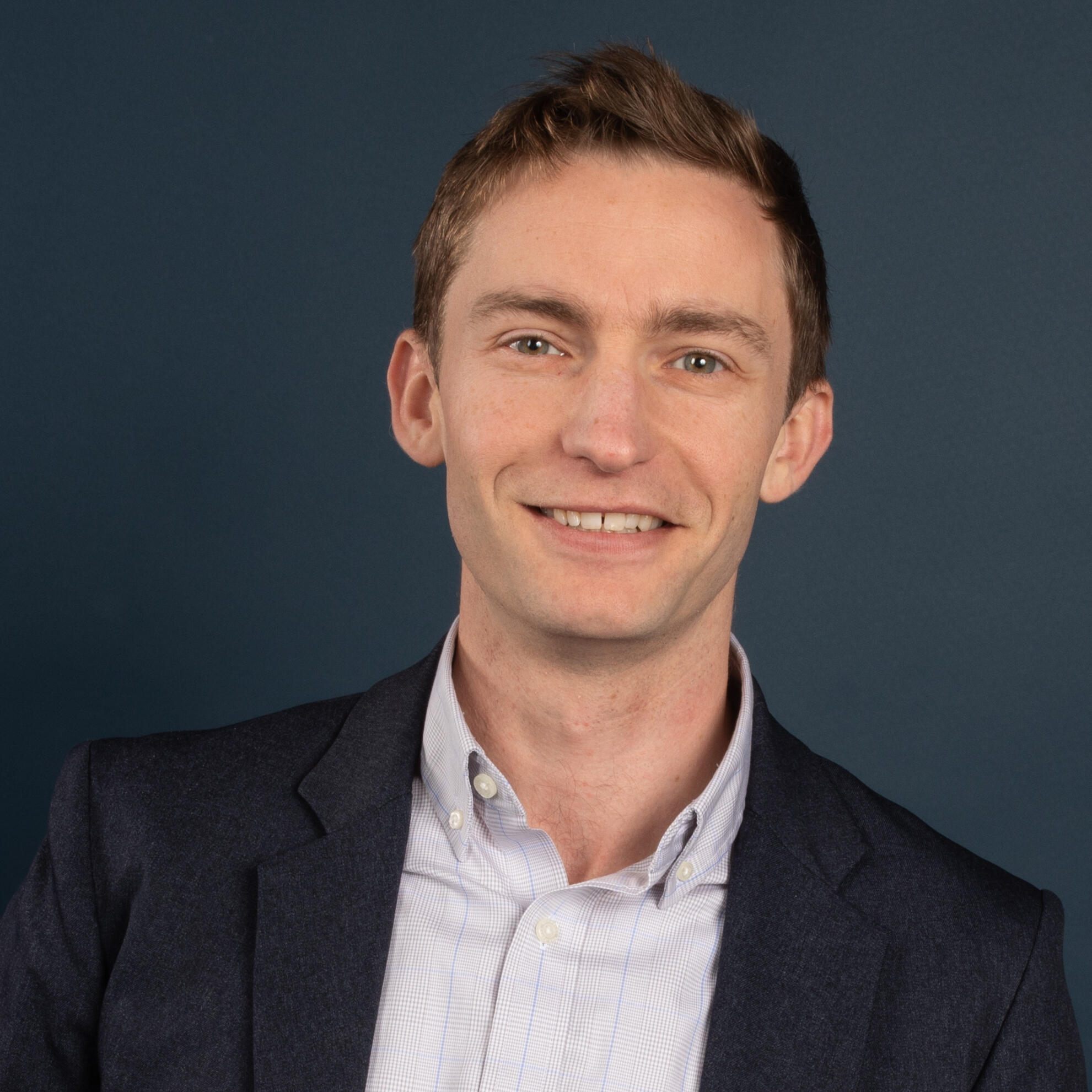Portrait of man, clothes, smile, colours.